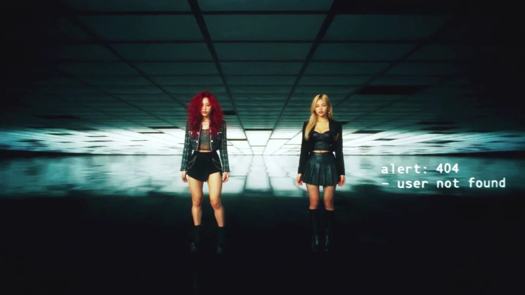 AI (KO) members Iris and Ivy standing in an empty white room as "alert: 404 – user not found" appears, in the OFFLiNE music video