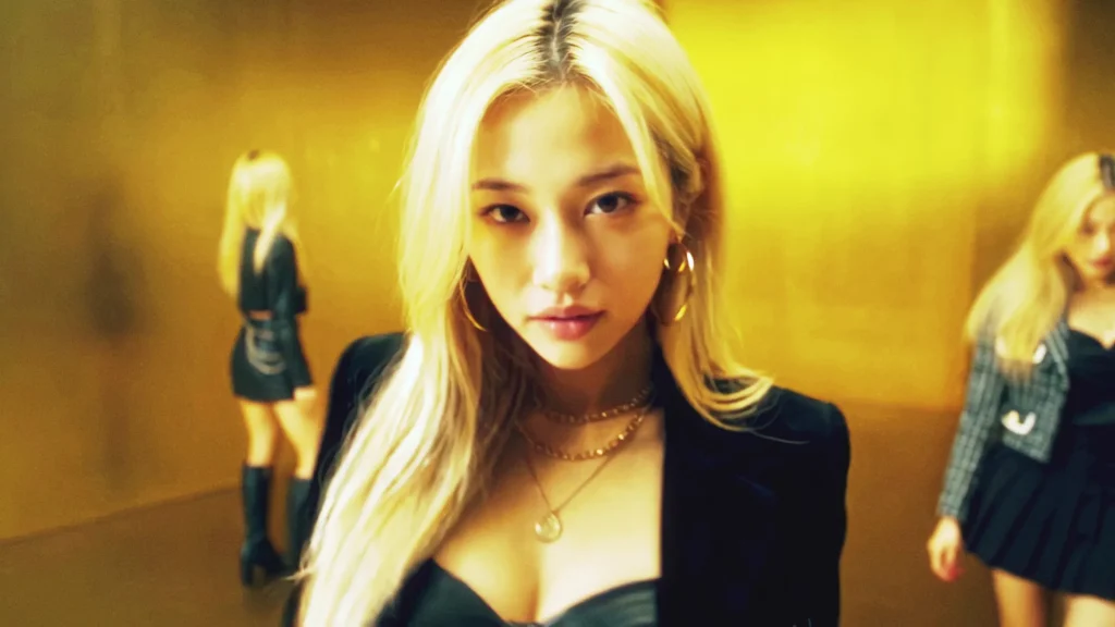 Ivy from AI (KO) shown three times in a gold room, wearing three different outfits, in the OFFLiNE music video